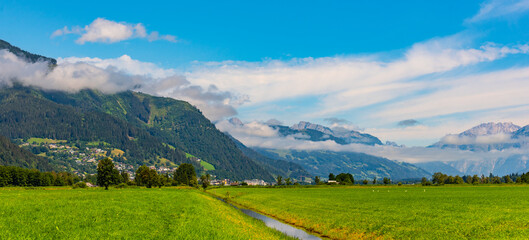 Broad mountain valley on sunny summer day. Austrian Alps, Austria