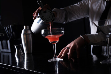  Cocktail on black background. Cocktail at the bar. Alcoholic drink at the night club.