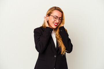 Caucasian business woman wearing a wireless headphones isolated on white background covering ears with hands.