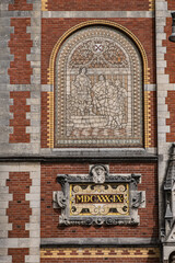 Architectural fragments of famous Rijksmuseum building (1885) in Amsterdam. Amsterdam Rijksmuseum holds many masterpiece paintings of Dutch and world art. Amsterdam, The Netherlands.