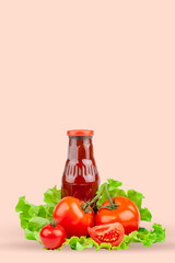Tomatoes, tomato ketchup and tomato juice with lettuce leaves, isolated on a pink background. Background with copy space.