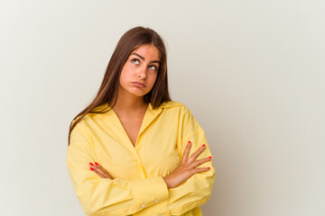 Obraz premium Young caucasian woman isolated on white background showing fist to camera, aggressive facial expression.