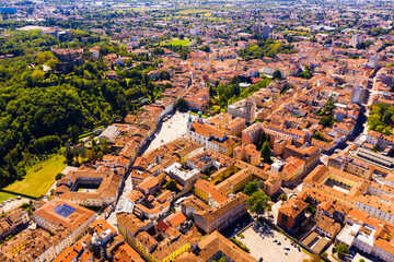 View from drone of historic centre of Gorizia with ancient castle on hill dominating city, Italy..