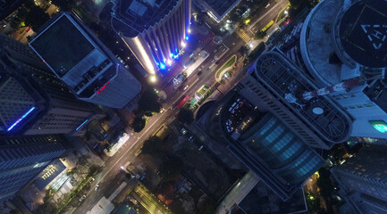 AERIAL. Cinematic view. Hight view to Kuala Lumpur city, Malaysia. Cityscape business skyscrapers night downtown.