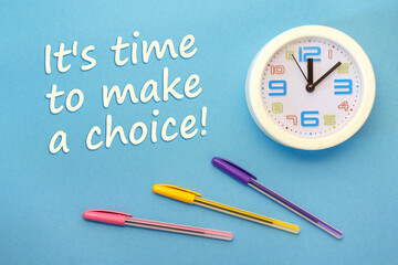 It's time to make a choice - lettering on a blue background and clock