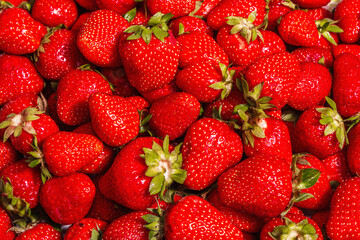 Strawberry background, fresh ripe fruits, summer food background