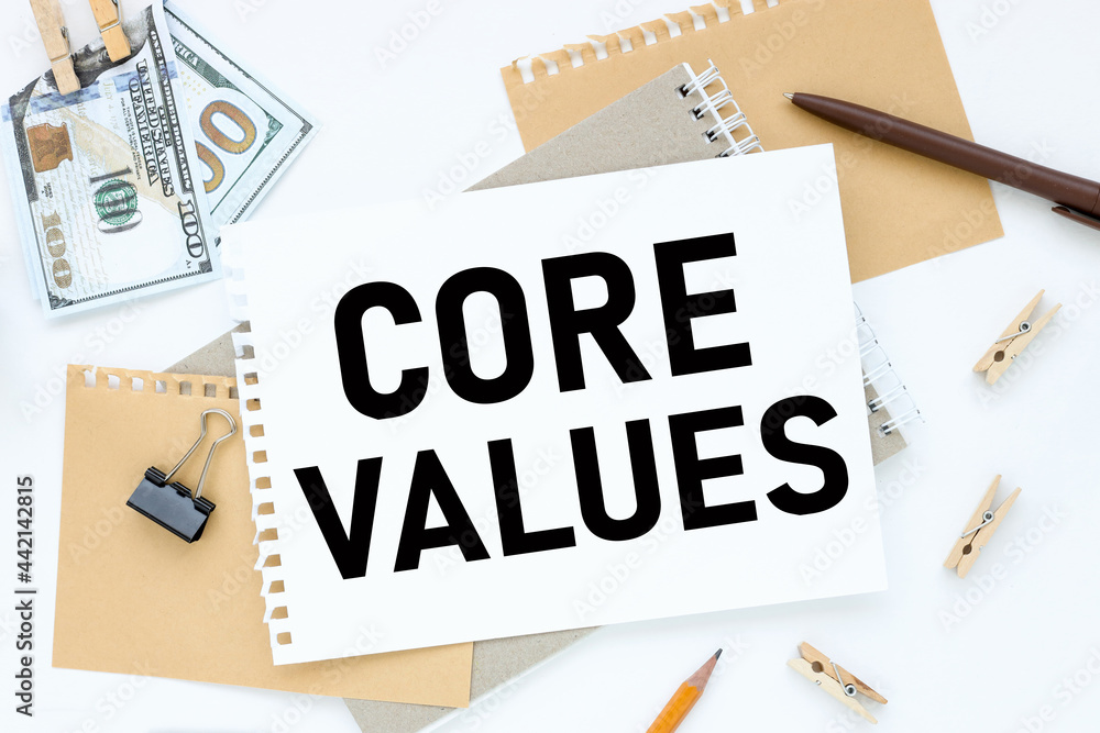 Poster core values. text on white notepad paper. on a white photo with torn paper
