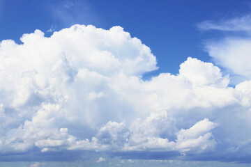Beautiful blue sky and large white cumulus clouds. Background. Scenery. Texture.