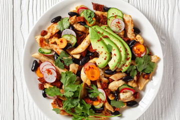 Mexican salad of black beans, chicken, and radish
