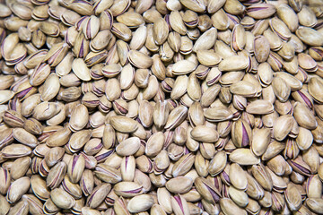 Pistachio nuts are white and gray in color with open shells. Fruits nuts vegetables berries useful products agriculture.