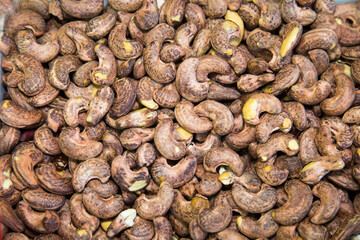 Indian walnut or cashew roasted brown with a beautiful pattern of the peel. Fruits nuts vegetables berries useful products agriculture.