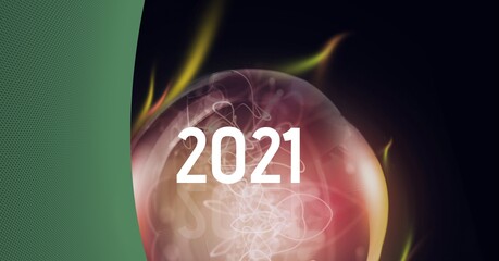 Composition of 2021 over red lit lightbulb