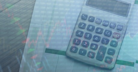 Composition of financial data processing over calculator on office desk