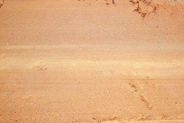 Close-up of a sand pit. Sand texture.