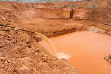 a powerful pump pumps out water from the pit drainage
