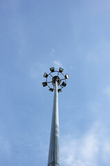 Spotlight pole in the sky background