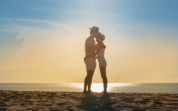 a young couple on the beach.