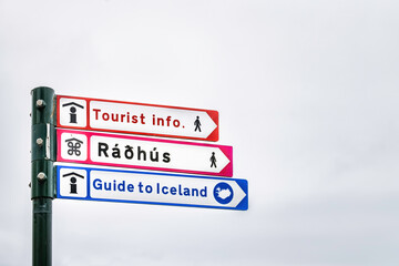Reykjavik, Iceland street road in downtown center and sign for directions to landmarks tourist information and guide