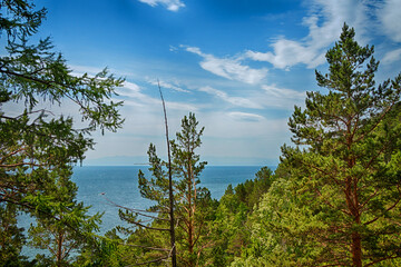 Beautiful natural landscape with a lake, mountains and plants. Lake Baikal.