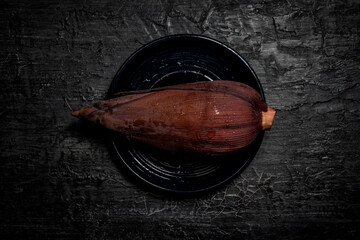 banana blossom on a plate