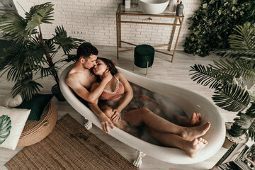 photo of young people in love taking a bath. mental rest. sexual instinct.carnal infatuation....