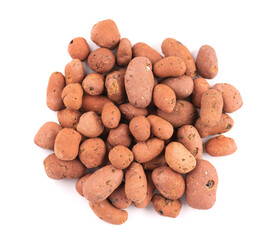 Expanded clay drainage isolated on white background. Whole brown clay pebbles. Top view.