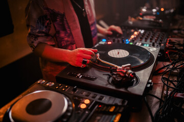 DJ mixing music during party in club