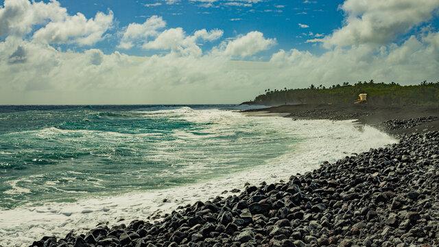 Big waves on the rocky coast. Pohoiki black sand beach, big island, Hawaii