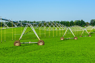 Modern irrigation system at the fertile agricultural field