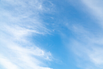 Summer Blue Sky and white cloud white background. Beautiful clear cloudy in sunlight spring season. vivid cyan cloudscape in nature environment. Outdoor horizon skyline with spring sunshine.