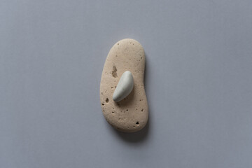 two stones on gray