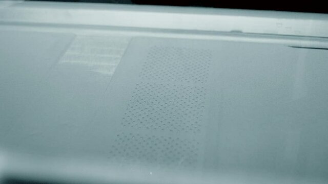 3D printer prints object from metal powder.