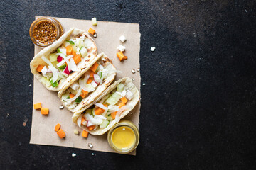 tacos stuffed vegetables doner kebab flatbread vegetable taco on the table healthy food meal snack copy space food background rustic. top view keto or paleo diet veggie vegan or vegetarian food