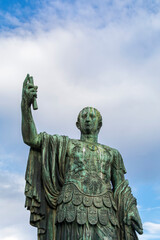 Fototapeta na wymiar Statue of Imp Caesari Nervae in dei Fori Imperiali street in Rome, Italy