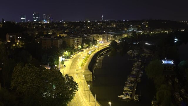 A timelapse of the busy streets of Prague quarters Podoli and Pankrac at night in 4K