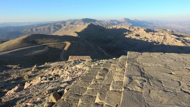 Mount Nemrut, Adiyaman, Turkey - 17th of June 2021: 4K Scenery from the stepped East terrace 
