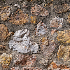 rough stone wall closeup, seamless natural background