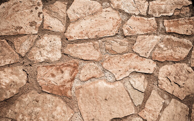 rough stone wall closeup, seamless natural background