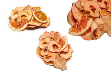 Dried fruit isolated on white background. Dried grapefruit, dried apple, dried pear.