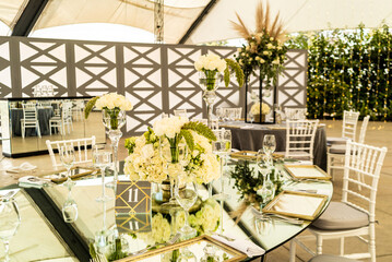 Jewish wedding outdoors with white roses
