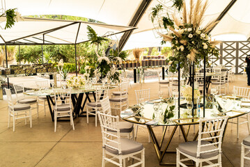 Jewish wedding outdoors with white roses