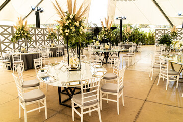 Jewish wedding outdoors with white roses