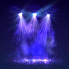 Spotlight on stage with smoke and light.