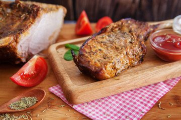 a piece of fried meat on a wooden table
