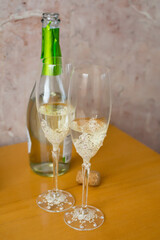 glass of champagne and bottle