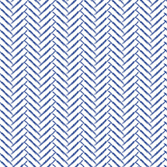 seamless chevron pattern in navy crayon or chalk on white background 