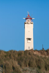 white and red Lighthouse of Noordwijk aan Zee in Netherlands