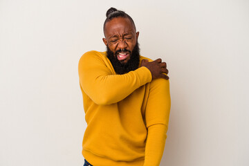 Obraz premium African american man with beard isolated on pink background having a shoulder pain.