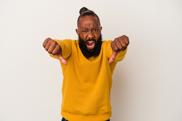African american man with beard isolated on pink background showing thumb down and expressing dislike.