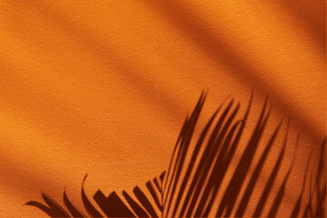 Tropical shadow on the orange wall. Minimal summer travel background